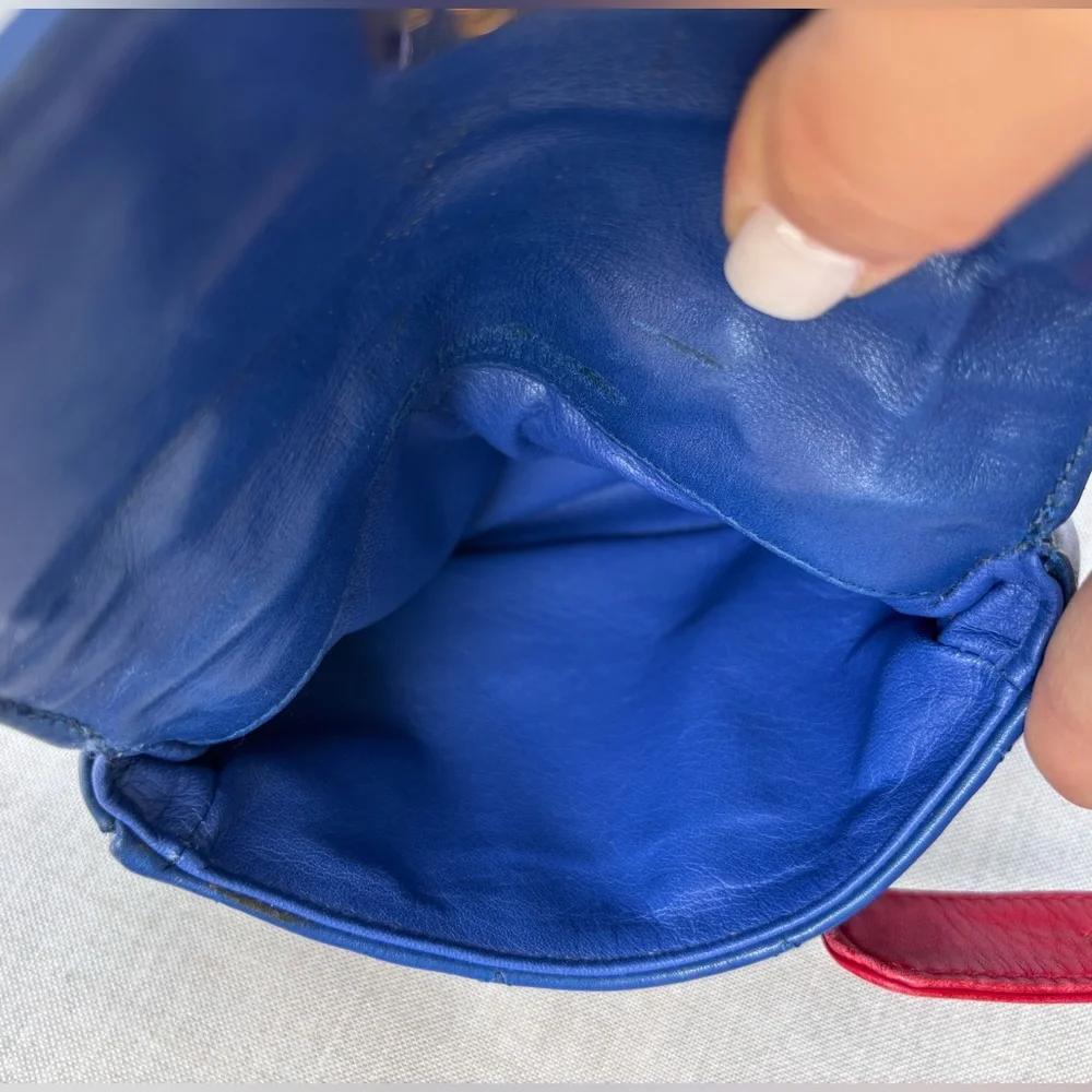 CHANEL Blue Quilted Mini Bag with Red Strap